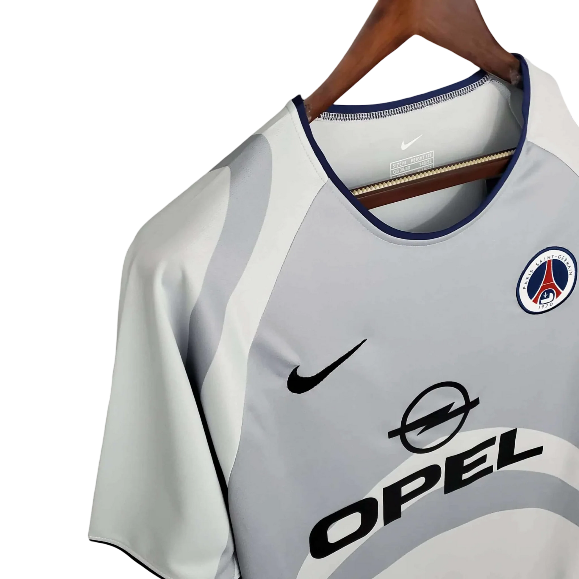 https://cdn.shopify.com/s/files/1/0826/7228/8075/files/20012002-paris-saint-germain-opel-away-grey-retro-jersey-557053.webp?v=1741198005