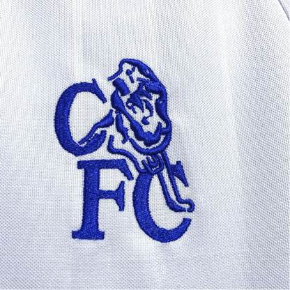 https://cdn.shopify.com/s/files/1/0826/7228/8075/files/20012003-chelsea-fly-emirates-away-retro-kit-classickits433-511675.webp?v=1741198261