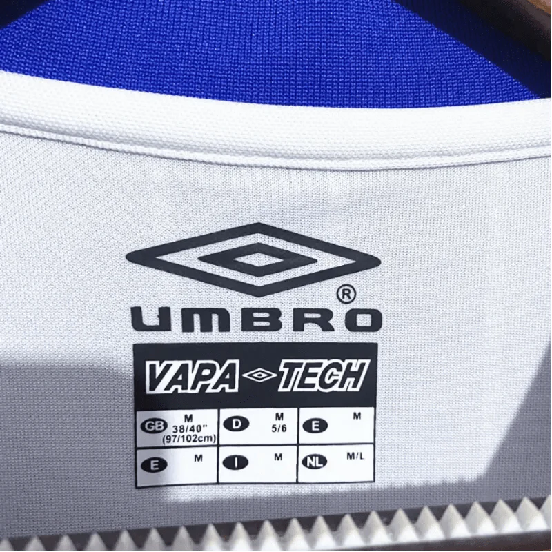 https://cdn.shopify.com/s/files/1/0826/7228/8075/files/20012003-chelsea-fly-emirates-away-retro-kit-classickits433-539378.webp?v=1741198261