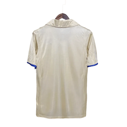 https://cdn.shopify.com/s/files/1/0826/7228/8075/files/20012003-fc-barcelona-away-retro-kit-811162.webp?v=1741197556