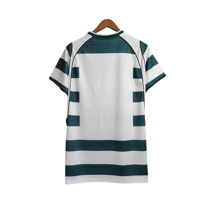 https://cdn.shopify.com/s/files/1/0826/7228/8075/files/20012003-sporting-lisbon-home-retro-jersey-at-govintagejersey-store-184542.webp?v=1741199327