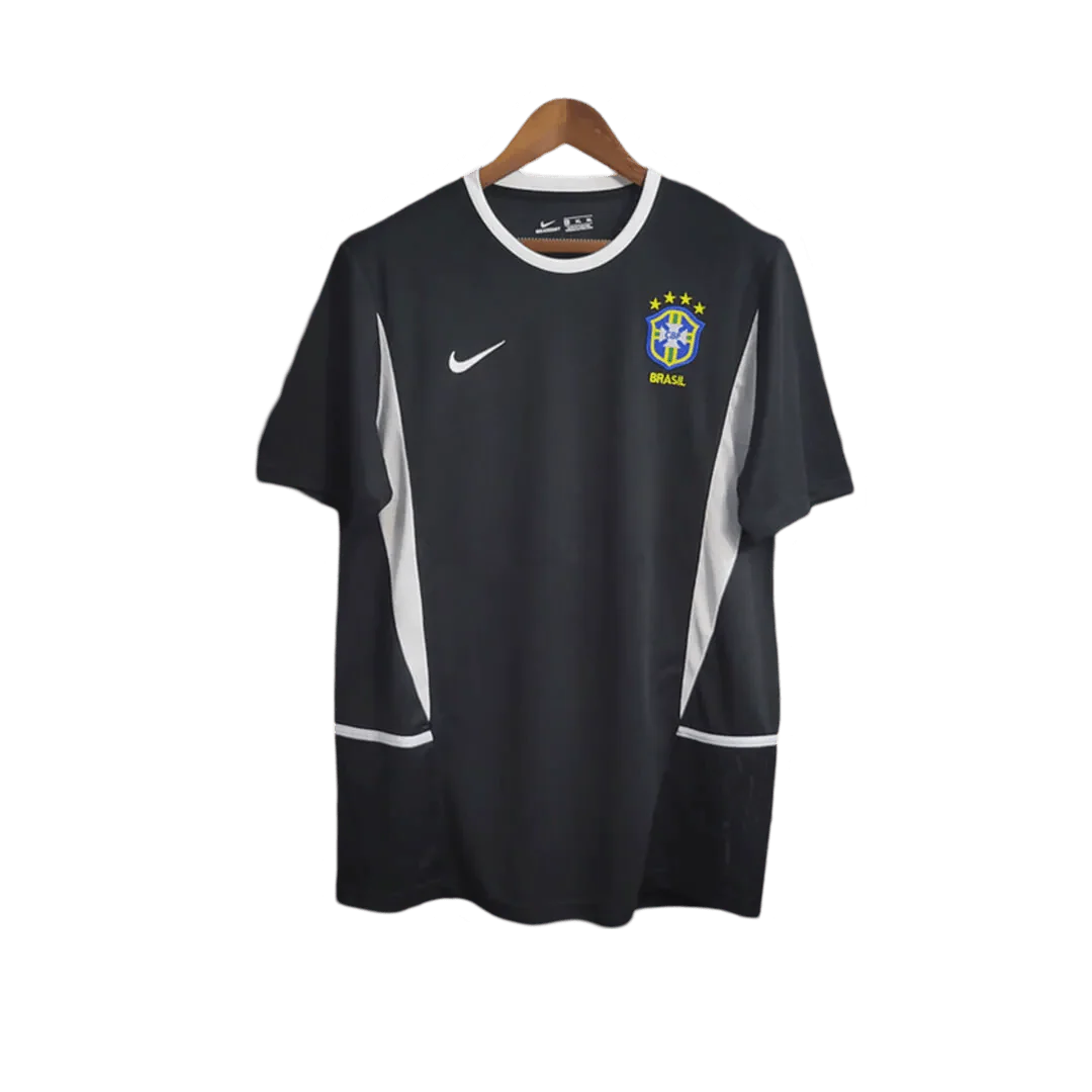 https://cdn.shopify.com/s/files/1/0826/7228/8075/files/2002-brazil-goalkeeper-dark-black-retro-kit-236036.webp?v=1741196945