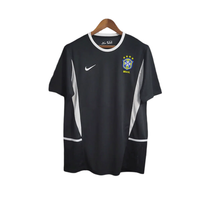 https://cdn.shopify.com/s/files/1/0826/7228/8075/files/2002-brazil-goalkeeper-dark-black-retro-kit-236036.webp?v=1741196945
