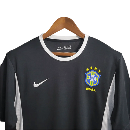 https://cdn.shopify.com/s/files/1/0826/7228/8075/files/2002-brazil-goalkeeper-dark-black-retro-kit-658406.webp?v=1741196947