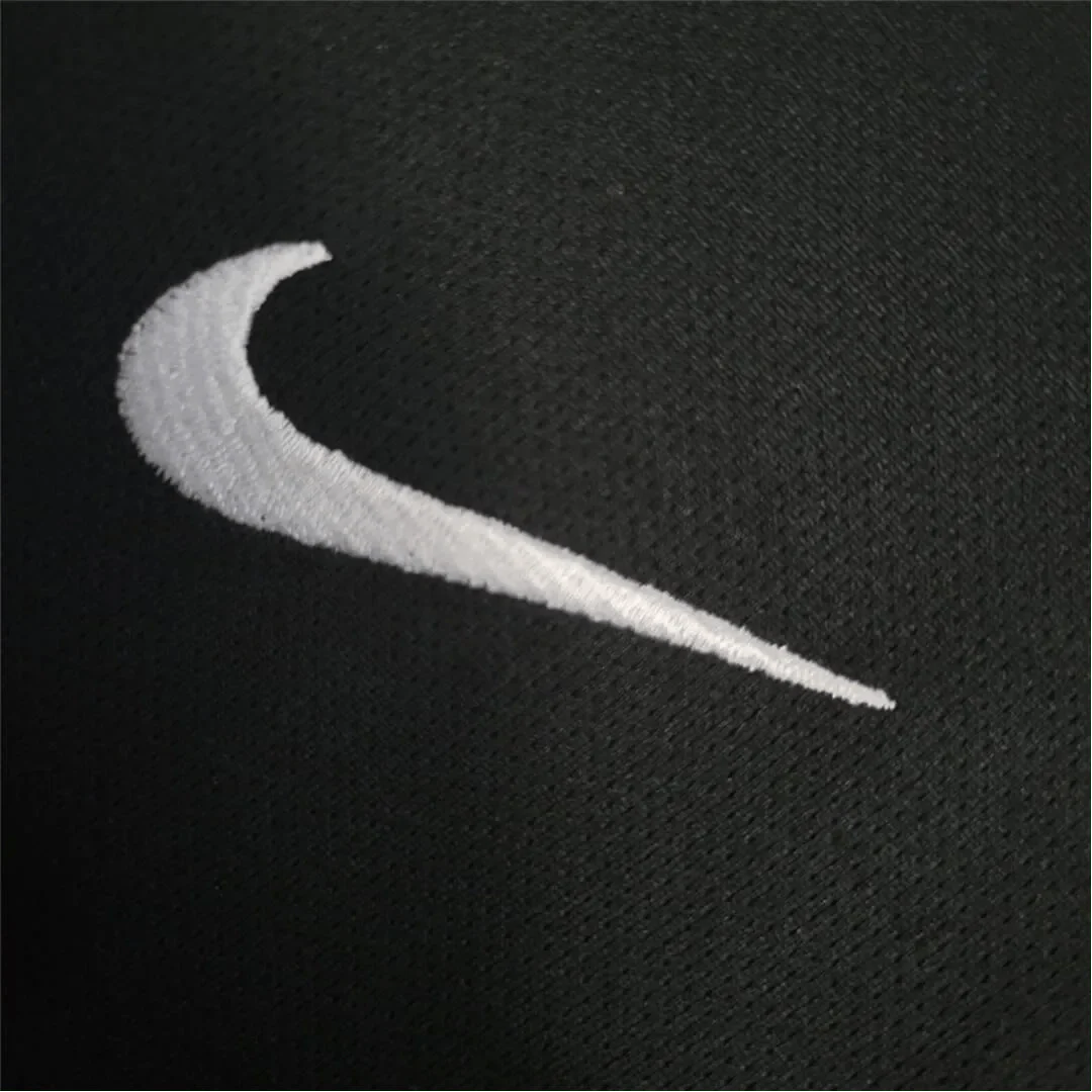 https://cdn.shopify.com/s/files/1/0826/7228/8075/files/2002-brazil-goalkeeper-dark-black-retro-kit-934384.webp?v=1741196945