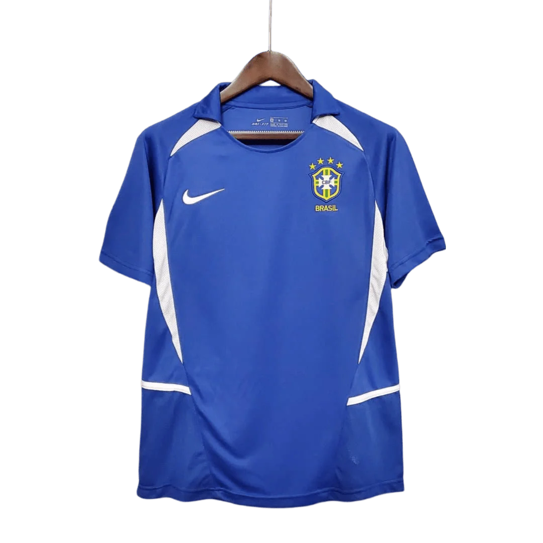 https://cdn.shopify.com/s/files/1/0826/7228/8075/files/2002-brazil-world-cup-away-retro-kit-classickits433-655160.webp?v=1741198765