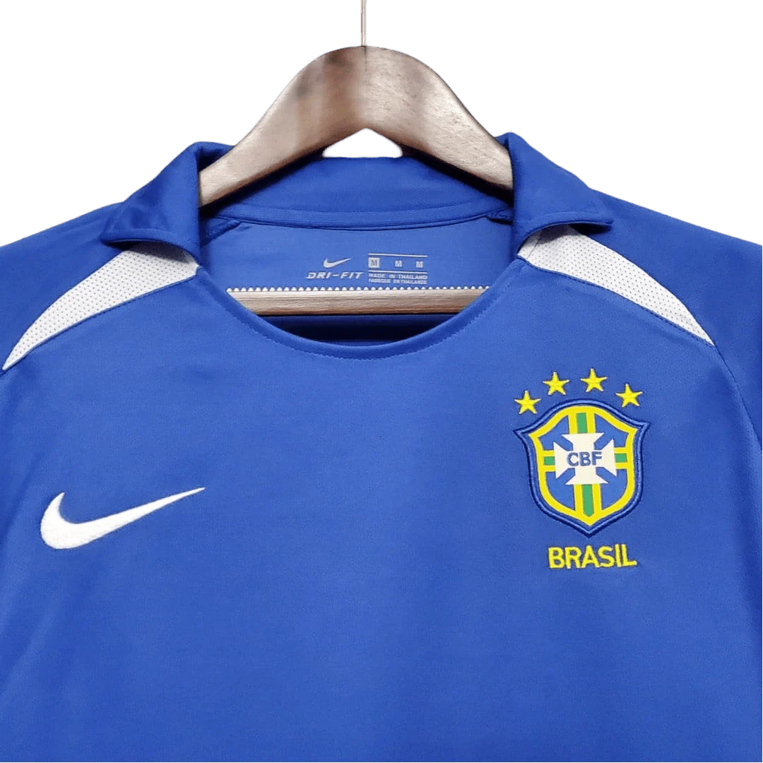 https://cdn.shopify.com/s/files/1/0826/7228/8075/files/2002-brazil-world-cup-away-retro-kit-classickits433-690064.webp?v=1741198762