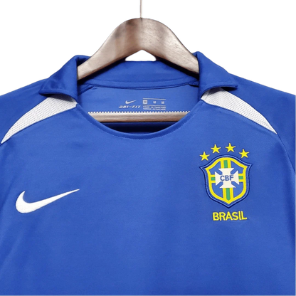https://cdn.shopify.com/s/files/1/0826/7228/8075/files/2002-brazil-world-cup-away-retro-kit-classickits433-690064.webp?v=1741198762