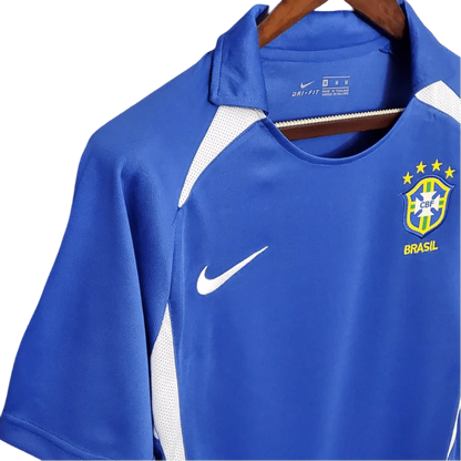 https://cdn.shopify.com/s/files/1/0826/7228/8075/files/2002-brazil-world-cup-away-retro-kit-classickits433-902750.webp?v=1741198761