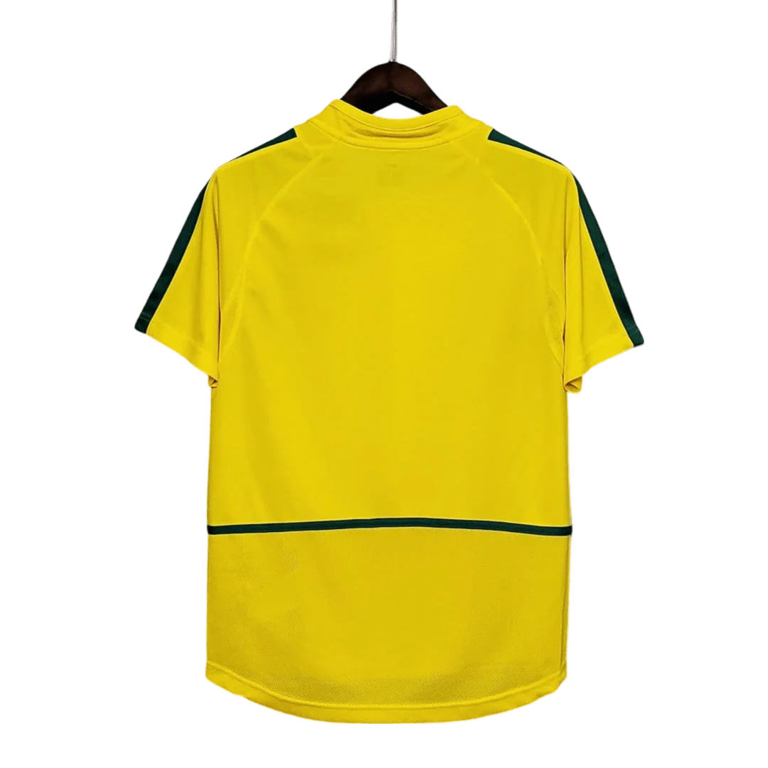 https://cdn.shopify.com/s/files/1/0826/7228/8075/files/2002-brazil-world-cup-home-retro-kit-classickits433-331500.webp?v=1741198809