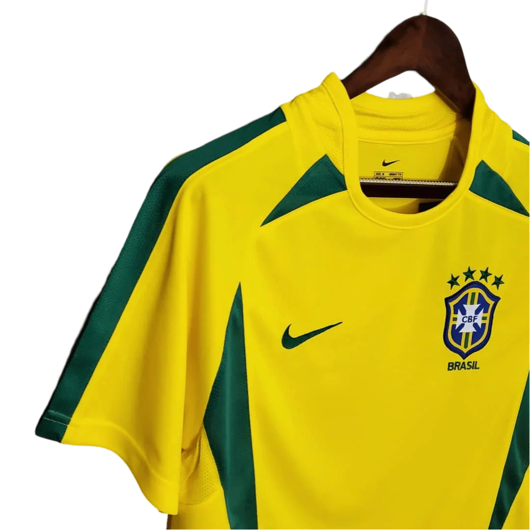 https://cdn.shopify.com/s/files/1/0826/7228/8075/files/2002-brazil-world-cup-home-retro-kit-classickits433-633755.webp?v=1741198810