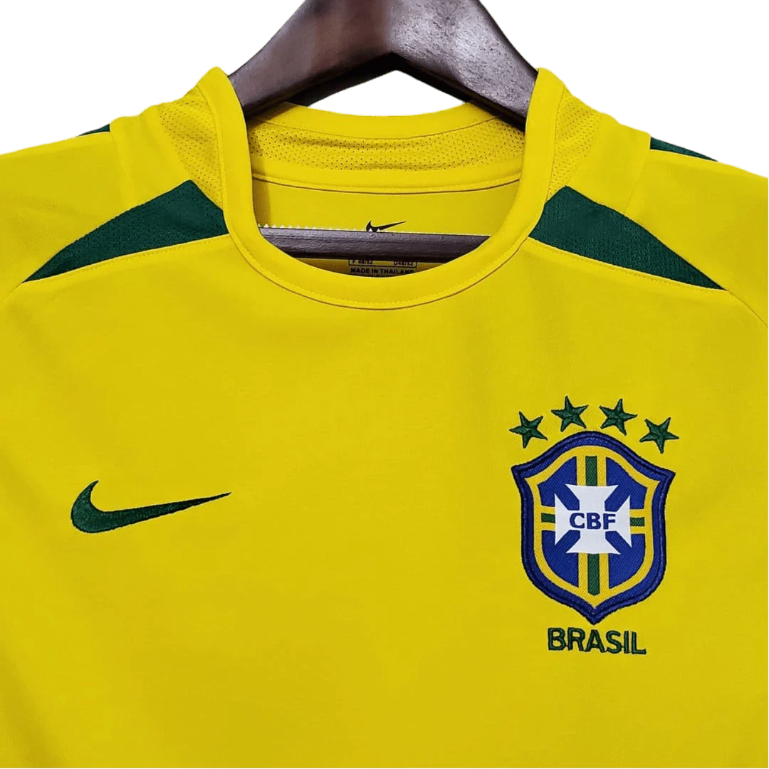https://cdn.shopify.com/s/files/1/0826/7228/8075/files/2002-brazil-world-cup-home-retro-kit-classickits433-957040.webp?v=1741198809