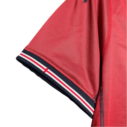 https://cdn.shopify.com/s/files/1/0826/7228/8075/files/2002-england-away-red-retro-kit-435989.webp?v=1741196951