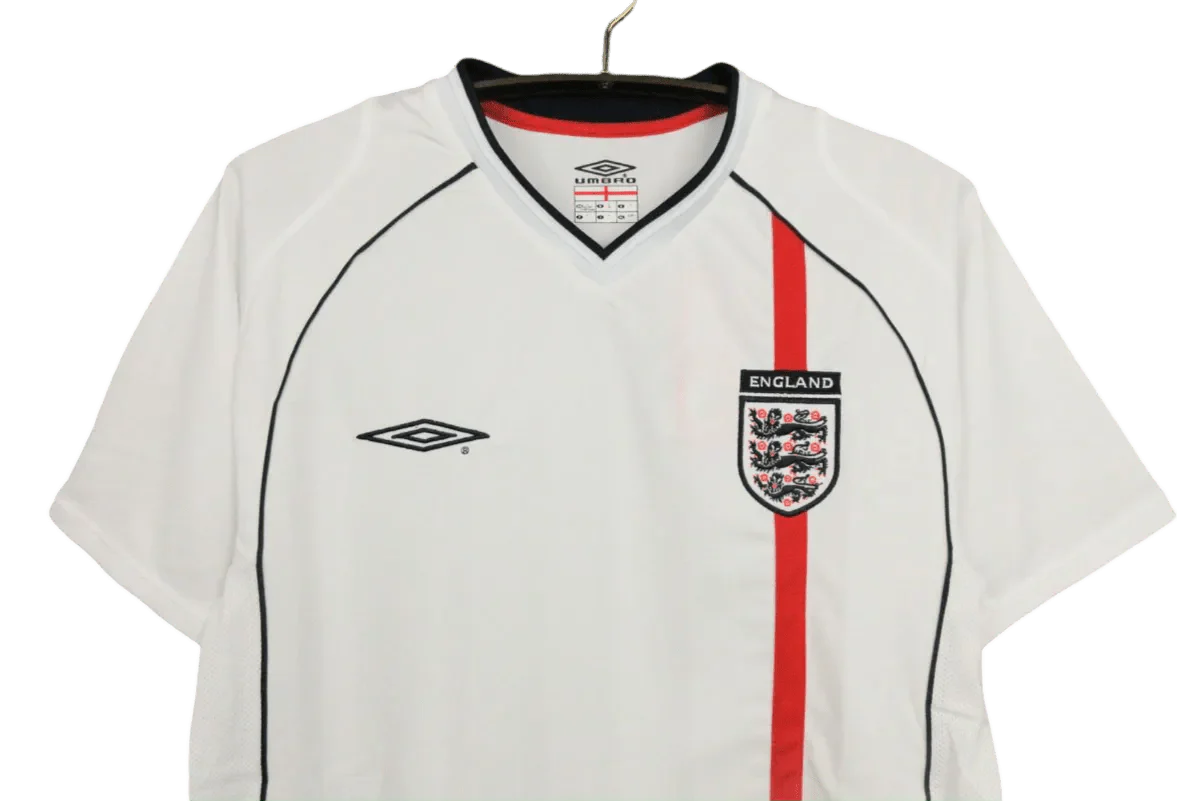 https://cdn.shopify.com/s/files/1/0826/7228/8075/files/2002-england-home-retro-kit-650275.webp?v=1741196944