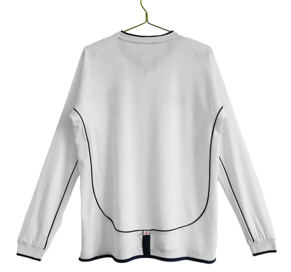 https://cdn.shopify.com/s/files/1/0826/7228/8075/files/2002-england-home-retro-kit-long-sleeves-513899.webp?v=1741197043
