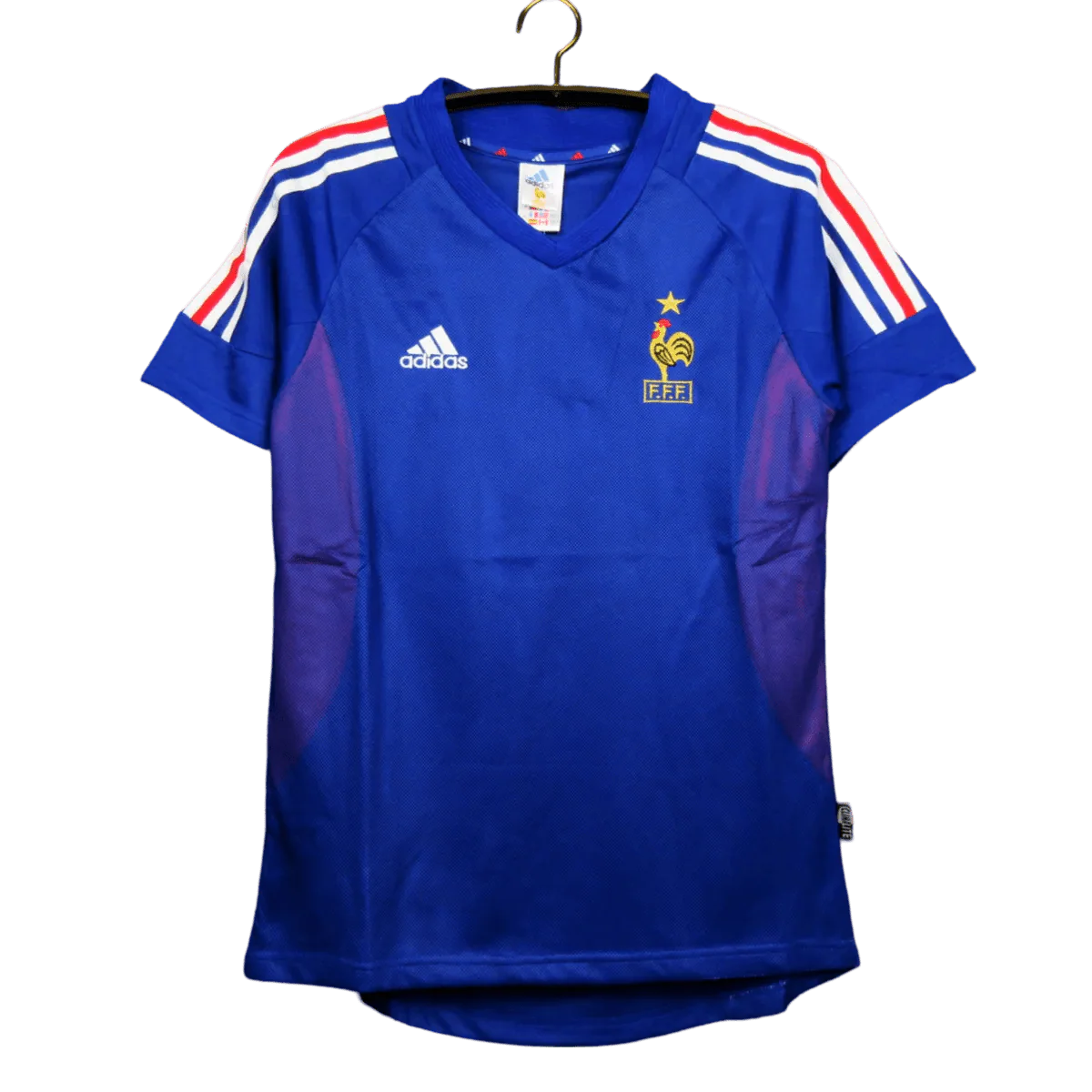 https://cdn.shopify.com/s/files/1/0826/7228/8075/files/2002-france-home-retro-kit-109199.webp?v=1741197156