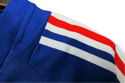 https://cdn.shopify.com/s/files/1/0826/7228/8075/files/2002-france-home-retro-kit-895610.webp?v=1741197159