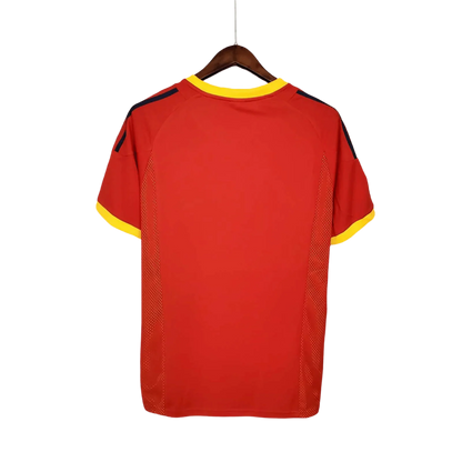 https://cdn.shopify.com/s/files/1/0826/7228/8075/files/2002-spain-home-red-retro-kit-203115.webp?v=1741197165