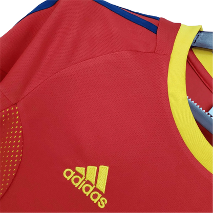 https://cdn.shopify.com/s/files/1/0826/7228/8075/files/2002-spain-home-red-retro-kit-344926.webp?v=1741197168