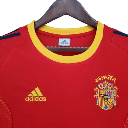 https://cdn.shopify.com/s/files/1/0826/7228/8075/files/2002-spain-home-red-retro-kit-954981.webp?v=1741197164