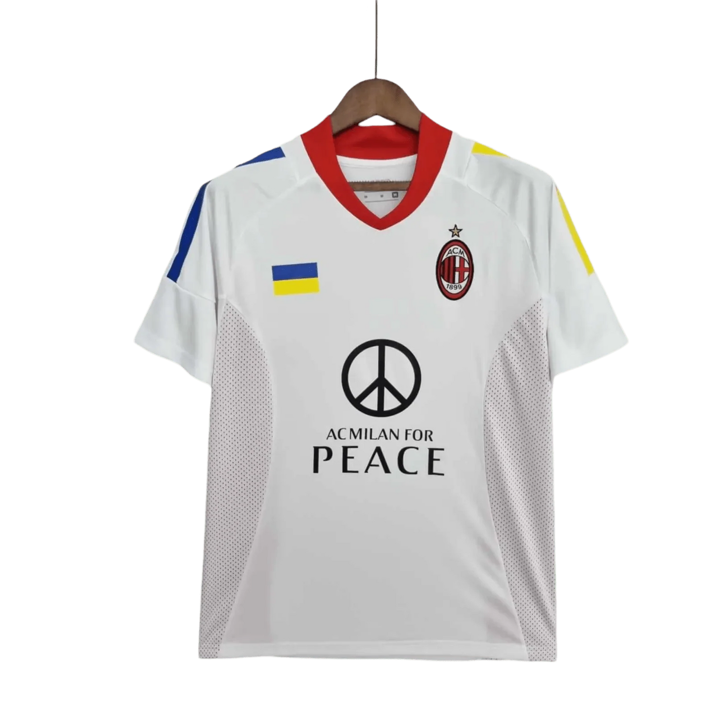 https://cdn.shopify.com/s/files/1/0826/7228/8075/files/20022003-ac-milan-for-peace-champions-league-final-edition-retro-kit-729501.webp?v=1741197276