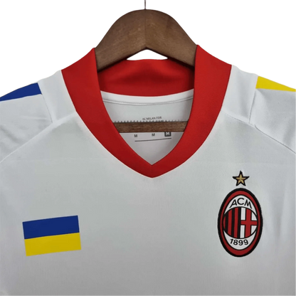 https://cdn.shopify.com/s/files/1/0826/7228/8075/files/20022003-ac-milan-for-peace-champions-league-final-edition-retro-kit-809235.webp?v=1741197273