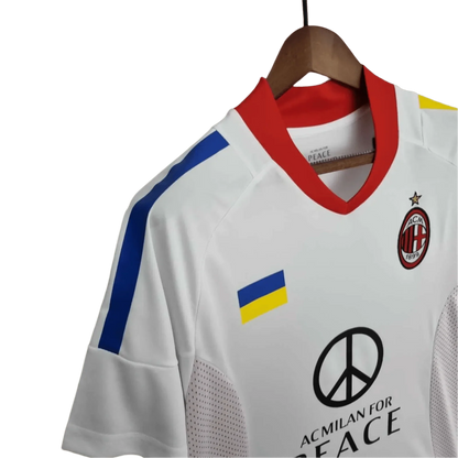 https://cdn.shopify.com/s/files/1/0826/7228/8075/files/20022003-ac-milan-for-peace-champions-league-final-edition-retro-kit-814226.webp?v=1741197276