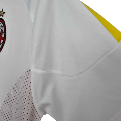 https://cdn.shopify.com/s/files/1/0826/7228/8075/files/20022003-ac-milan-for-peace-champions-league-final-edition-retro-kit-987030.webp?v=1741197273