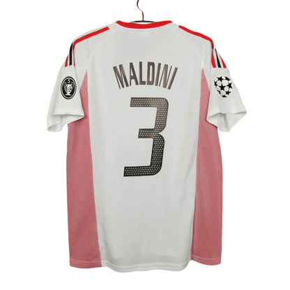 https://cdn.shopify.com/s/files/1/0826/7228/8075/files/20022003-ac-milan-opel-away-retro-kit-522203.webp?v=1741197286