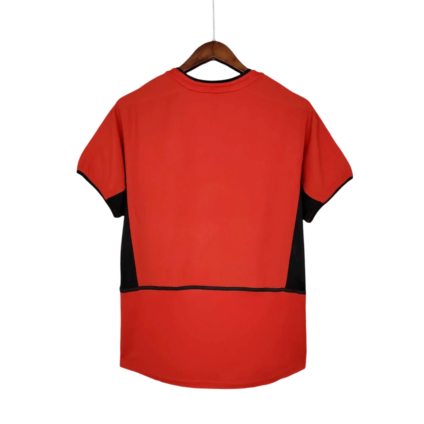 https://cdn.shopify.com/s/files/1/0826/7228/8075/files/20022003-manchester-united-vodafone-home-retro-kit-classickits433-653087.webp?v=1741197750