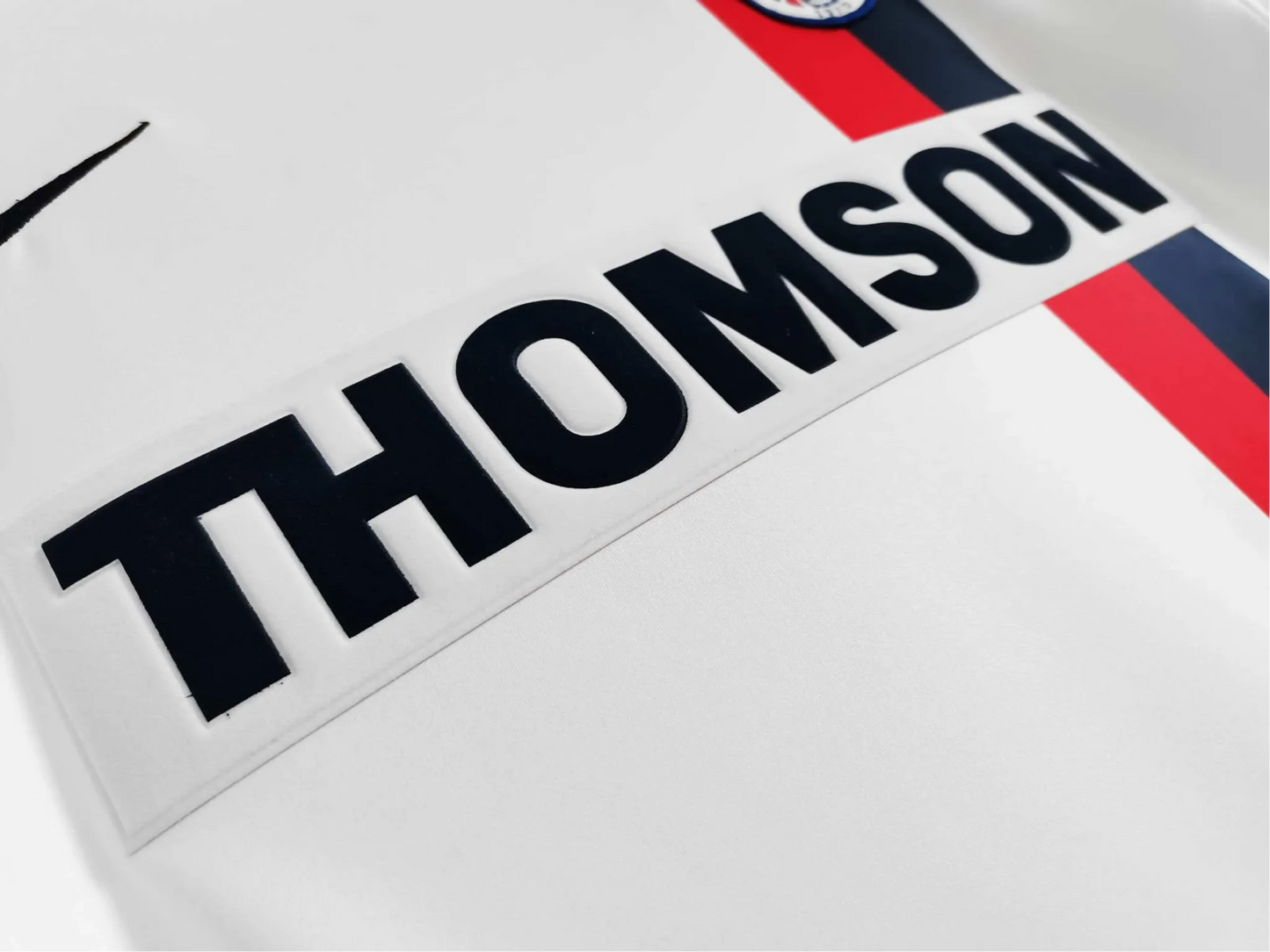 https://cdn.shopify.com/s/files/1/0826/7228/8075/files/20022003-paris-saint-germain-thomson-away-retro-kit-290483.webp?v=1741198002