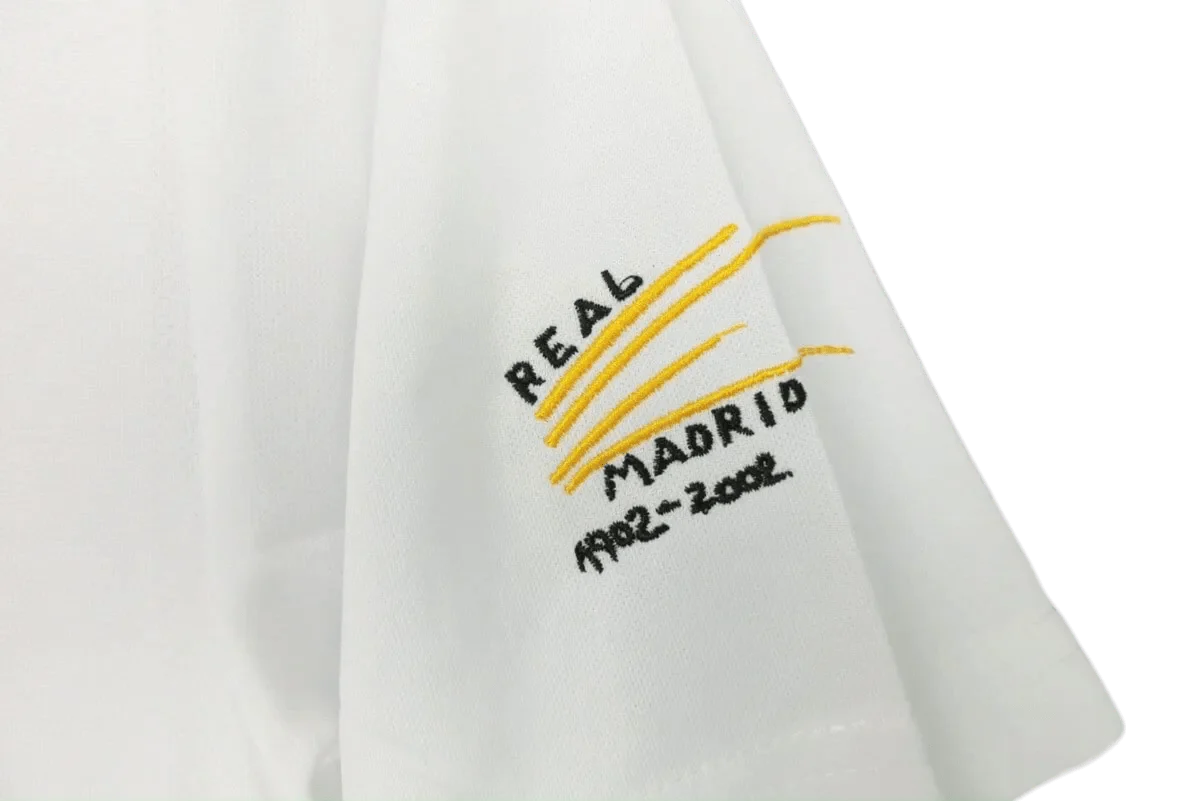 https://cdn.shopify.com/s/files/1/0826/7228/8075/files/20022003-real-madrid-siemens-mobile-home-retro-kit-288974.webp?v=1741197440