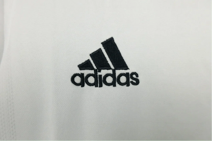 https://cdn.shopify.com/s/files/1/0826/7228/8075/files/20022003-real-madrid-siemens-mobile-home-retro-kit-346543.webp?v=1741197442