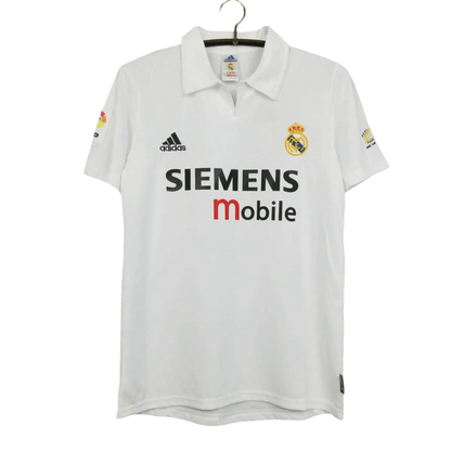 https://cdn.shopify.com/s/files/1/0826/7228/8075/files/20022003-real-madrid-siemens-mobile-home-retro-kit-423256.webp?v=1741197441