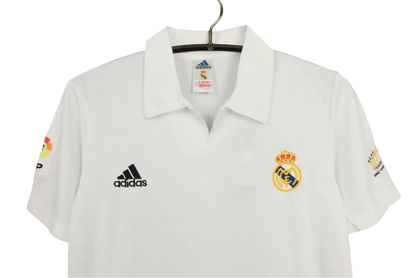 https://cdn.shopify.com/s/files/1/0826/7228/8075/files/20022003-real-madrid-siemens-mobile-home-retro-kit-842577.webp?v=1741197441
