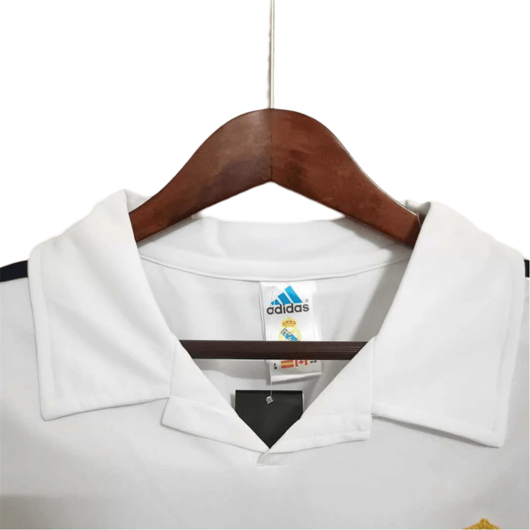 https://cdn.shopify.com/s/files/1/0826/7228/8075/files/20022003-real-madrid-zidane-siemens-mobile-white-retro-kit-classickits433-264486.webp?v=1741199036
