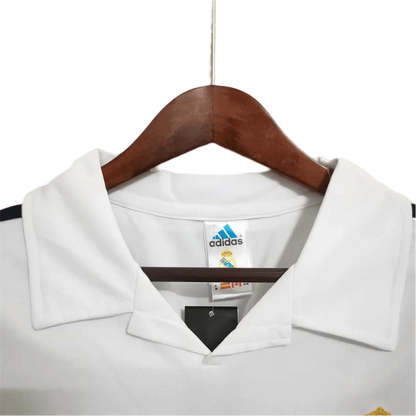 https://cdn.shopify.com/s/files/1/0826/7228/8075/files/20022003-real-madrid-zidane-siemens-mobile-white-retro-kit-classickits433-264486.webp?v=1741199036