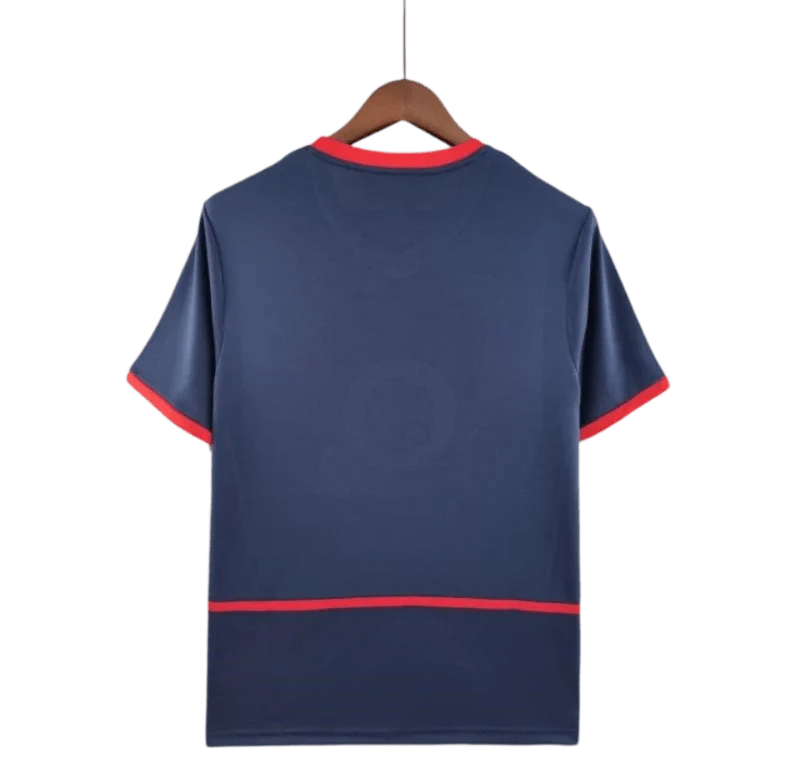 https://cdn.shopify.com/s/files/1/0826/7228/8075/files/20022004-arsenal-sponsor-o2-blue-away-retro-kit-classickits433-138808.webp?v=1741199333