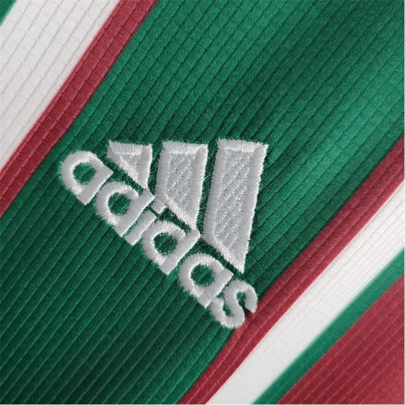 https://cdn.shopify.com/s/files/1/0826/7228/8075/files/2003-fluminense-unimed-home-retro-jersey-at-govintagejersey-175073.webp?v=1741197043