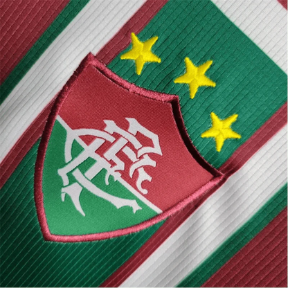 https://cdn.shopify.com/s/files/1/0826/7228/8075/files/2003-fluminense-unimed-home-retro-jersey-at-govintagejersey-212496.webp?v=1741197045