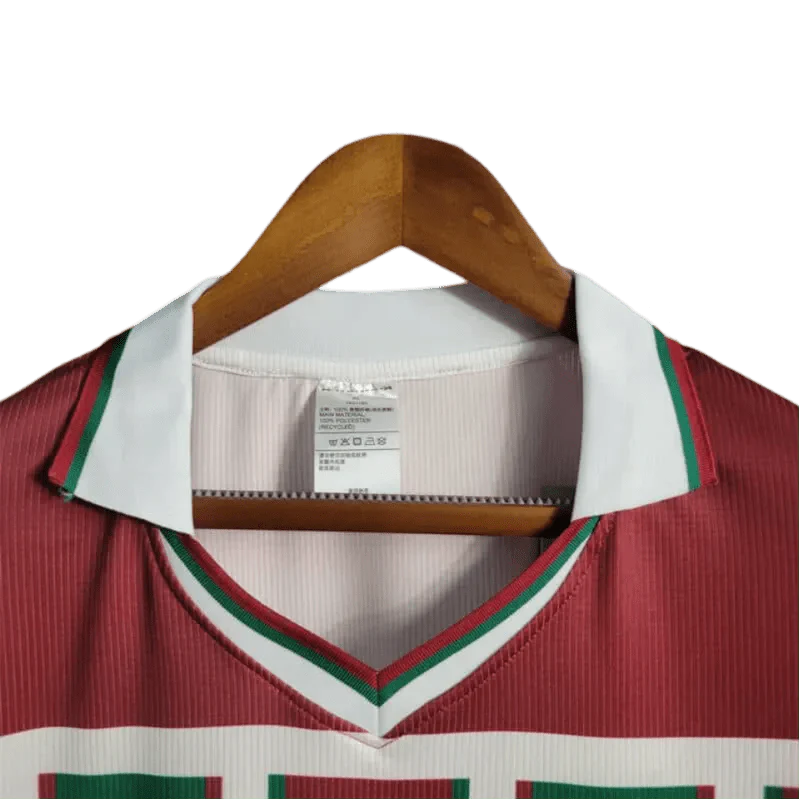 https://cdn.shopify.com/s/files/1/0826/7228/8075/files/2003-fluminense-unimed-home-retro-jersey-at-govintagejersey-236897.webp?v=1741197043