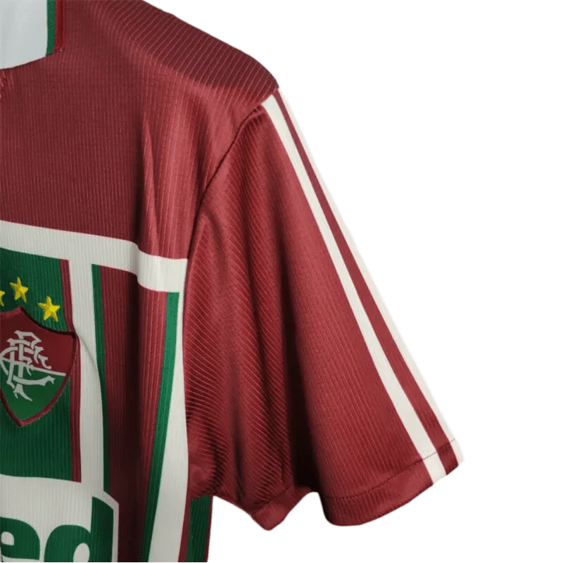 https://cdn.shopify.com/s/files/1/0826/7228/8075/files/2003-fluminense-unimed-home-retro-jersey-at-govintagejersey-512682.webp?v=1741197042