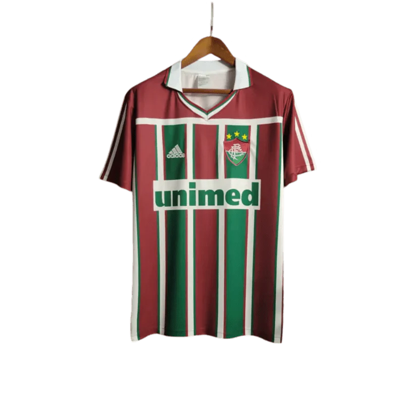 https://cdn.shopify.com/s/files/1/0826/7228/8075/files/2003-fluminense-unimed-home-retro-jersey-at-govintagejersey-860118.webp?v=1741197043