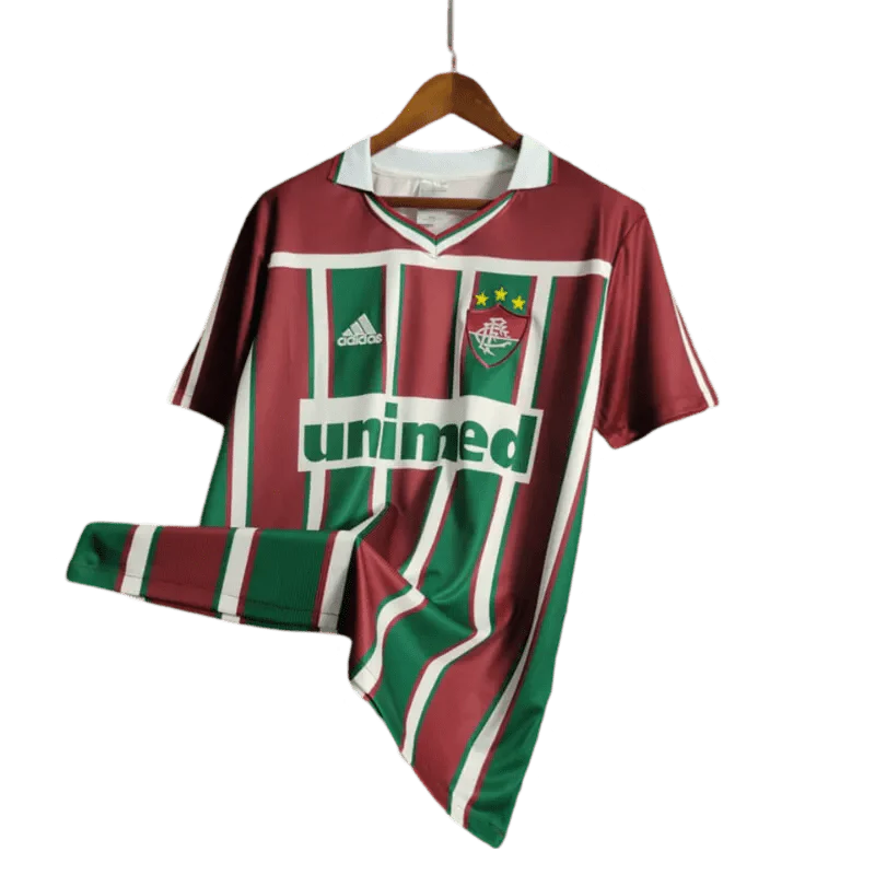 https://cdn.shopify.com/s/files/1/0826/7228/8075/files/2003-fluminense-unimed-home-retro-jersey-at-govintagejersey-927823.webp?v=1741197044