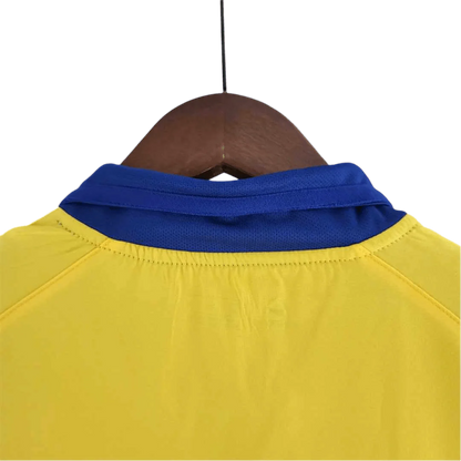 https://cdn.shopify.com/s/files/1/0826/7228/8075/files/20032005-arsenal-sponsor-o2-yellow-away-retro-kit-classickits433-366072.webp?v=1741199349