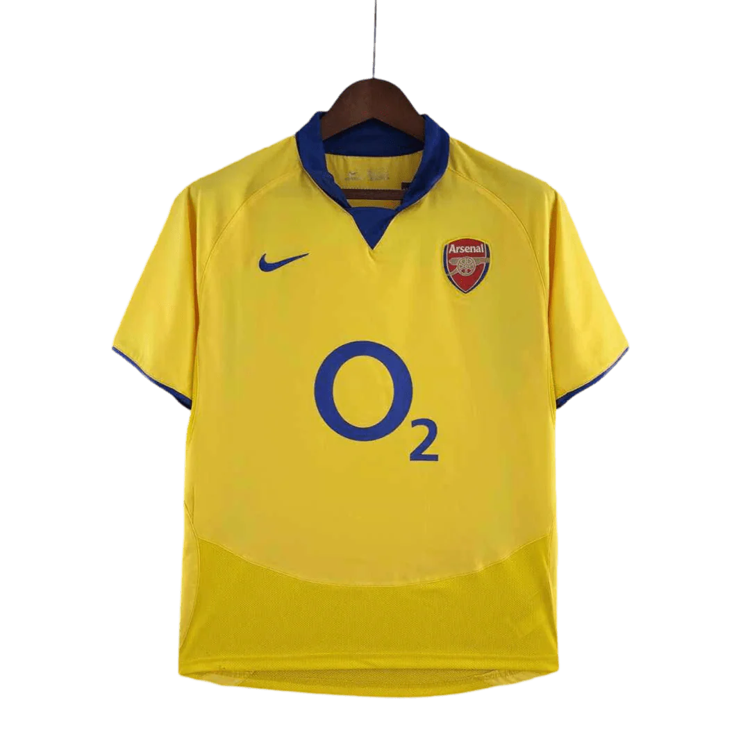 https://cdn.shopify.com/s/files/1/0826/7228/8075/files/20032005-arsenal-sponsor-o2-yellow-away-retro-kit-classickits433-625689.webp?v=1741199348