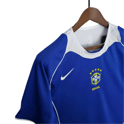 https://cdn.shopify.com/s/files/1/0826/7228/8075/files/2004-brazil-away-retro-kit-109228.webp?v=1741196950
