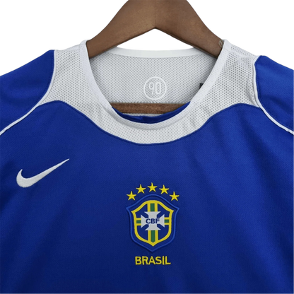 https://cdn.shopify.com/s/files/1/0826/7228/8075/files/2004-brazil-away-retro-kit-572892.webp?v=1741196948