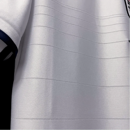 https://cdn.shopify.com/s/files/1/0826/7228/8075/files/2004-england-home-retro-kit-155048.webp?v=1741196964