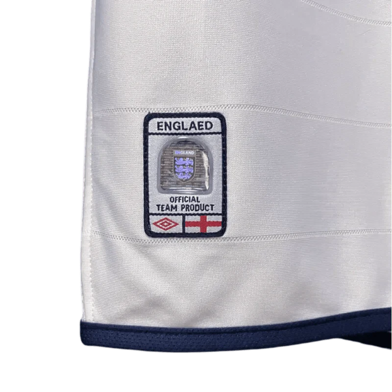 https://cdn.shopify.com/s/files/1/0826/7228/8075/files/2004-england-home-retro-kit-255930.webp?v=1741196963
